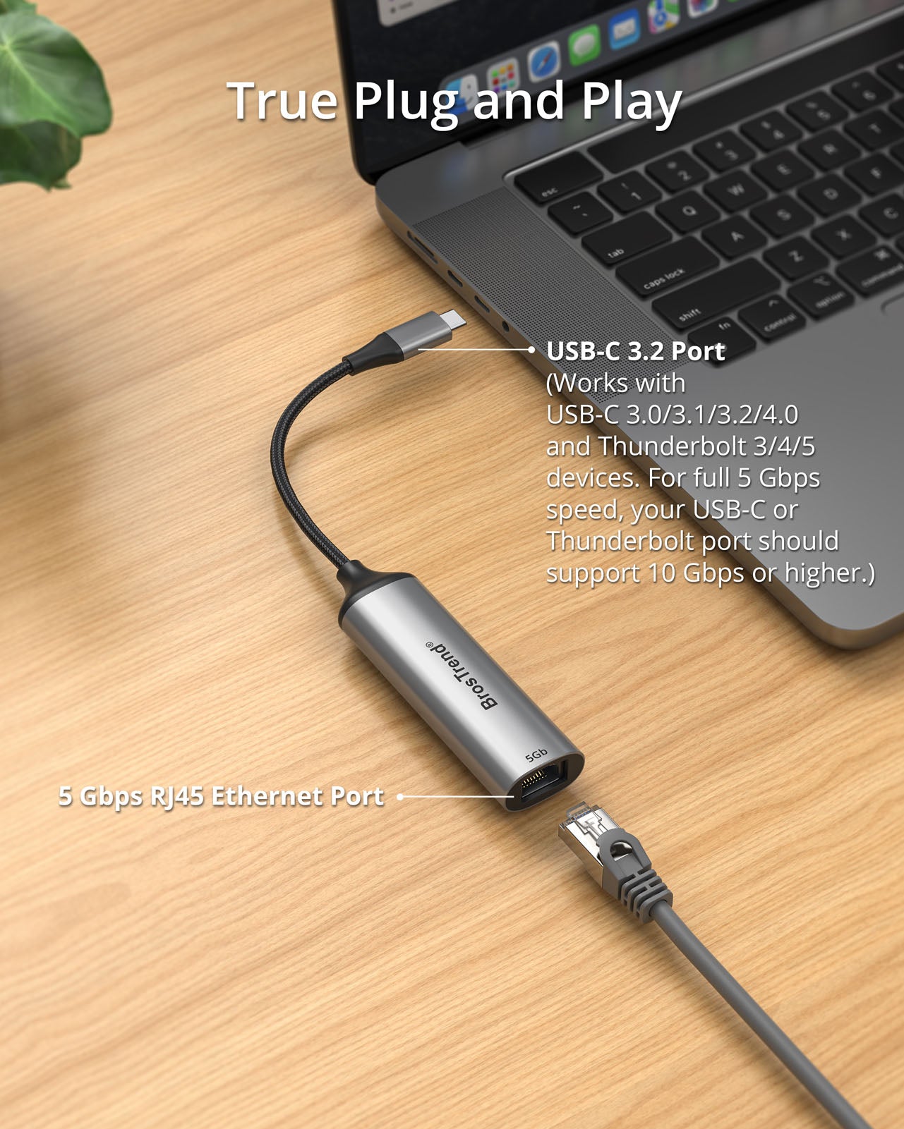 USB-C to 5 Gbps Ethernet Adapter Placed beside a Laptop Highlighting Its USB-C 3.2 Connector and 5Gb RJ45 Ethernet Port Demonstrating Simple Plug-and-play Setup Compatible with USB Type-C 3.0 3.1 3.2 4.0 and Thunderbolt 3 4 5